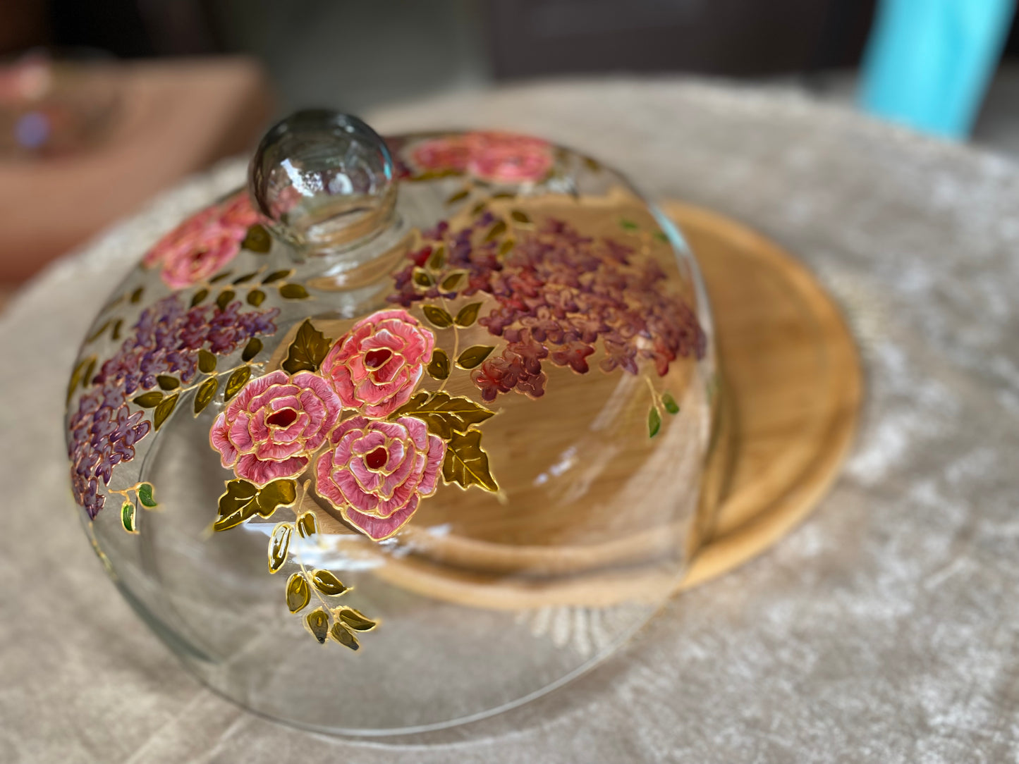 Glass cloche on wooden base