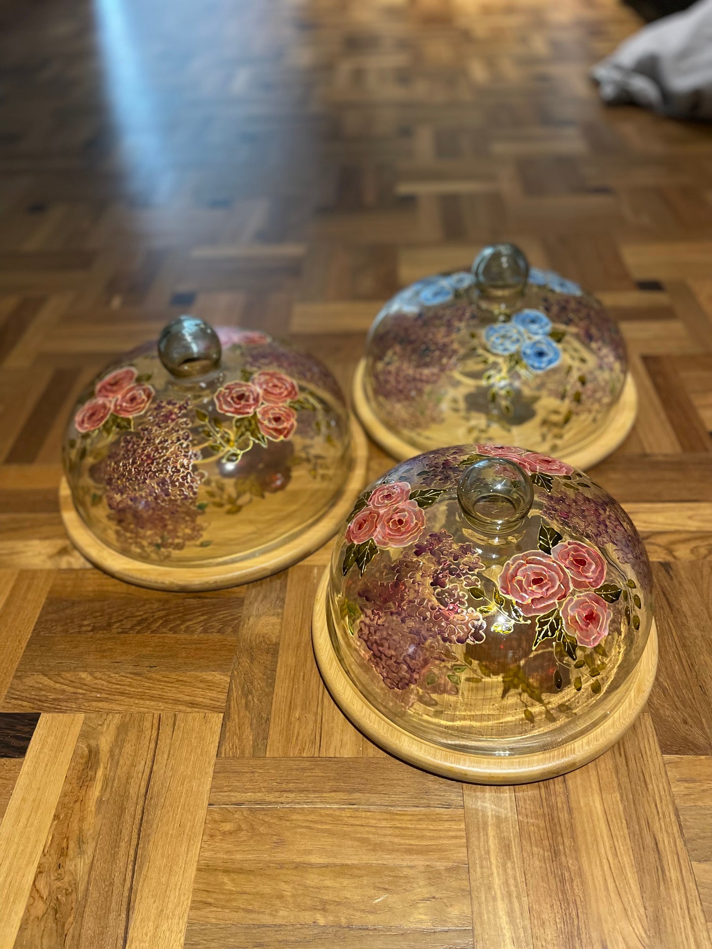 Glass cloche on wooden base