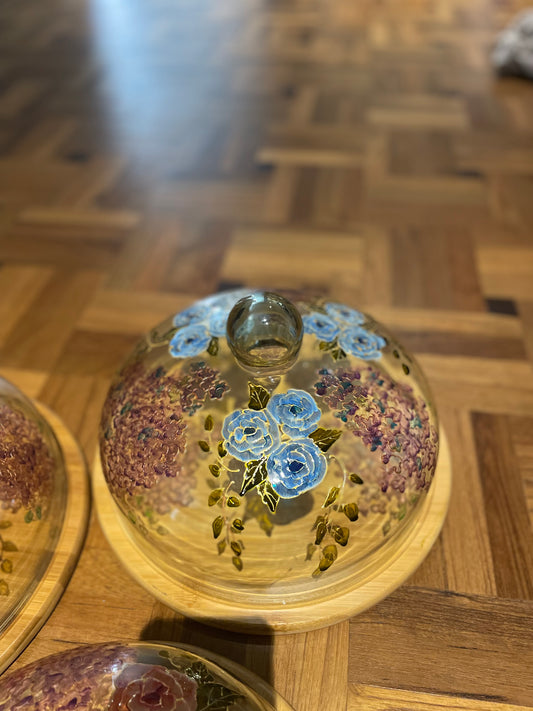 Glass cloche on wooden base